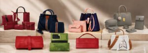 Leather and Kids women's handbag collection featuring multi-piece sets, clutches, and wallets in various colors