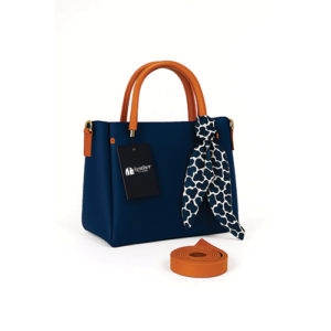 Leather and Kids navy blue leather tote bag with tan handles and printed scarf accent