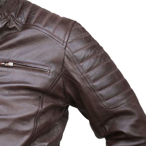 Close-up of brown leather jacket quilted shoulder panel and zip pocket – Leather and Kids