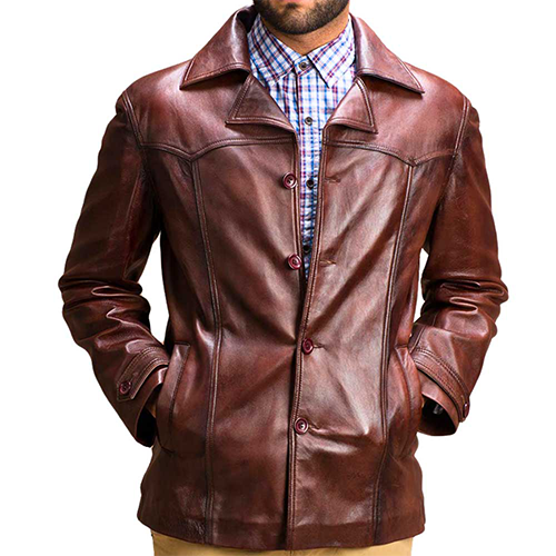 Front view of men's vintage brown leather coat with hands in pockets and button front – Leather and Kids